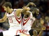 Houston Rockets' Chandler Parsons (25) and James Harden (13) celebrate during a timeout after teammate Toney Douglas hit a three-point shot during the fourth quarter of an NBA basketball game against the Boston Celtics Friday, Dec. 14, 2012, in Houston. The Rockets beat the Celtics 101-89. (AP Photo/David J. Phillip)