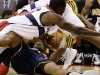 Washington Wizards center Earl Barron, top, dives for the ball as Indiana Pacers forward Sam Young holds on to it, during the first half of an NBA basketball game Monday, Nov. 19, 2012, in Washington.( AP Photo/Alex Brandon)