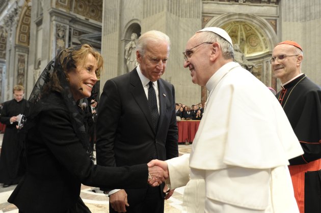 U.S. Vice President Joe Biden and his wife Jill (L) are greeted by Pope Francis in Saint Peter's Basilica after his inauguration at the Vatican, in a picture released by Osservatore Romano March 19, 2013. Pope Francis celebrates his inaugural mass on Tuesday among political and religious leaders from around the world and amid a wave of hope for a renewal of the scandal-plagued Roman Catholic Church.                REUTERS/Osservatore Romano (VATICAN  - Tags: RELIGION POLITICS) FOR EDITORIAL USE ONLY. NOT FOR SALE FOR MARKETING OR ADVERTISING CAMPAIGNS. THIS IMAGE HAS BEEN SUPPLIED BY A THIRD PARTY. IT IS DISTRIBUTED, EXACTLY AS RECEIVED BY REUTERS, AS A SERVICE TO CLIENTS.