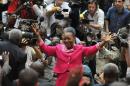The mayor of Bangui, Catherine Samba-Panza, waves after being elected interim president of the Central African Republic on January 20, 2014, in Bangui