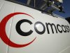 FILE - This Feb. 11, 2011 file photo shows the logo on a Comcast truck in Pittsburgh.    Comcast reported on Wednesday Aug. 1, 2012 strong second-quarter earnings  from cable operations which overcame returns of the box-office flop "Battleship."   (AP Photo/Gene J. Puskar, file)