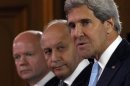 US Secretary of State Kerry, British Foreign Secretary Hague and French Foreign Minister Fabius attend a news conference after a meeting on Syria conflict at the Quai d'Orsay ministry in Paris