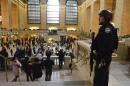 A member of the NYPD Joint Terrorism Task Force patrol Grand Central Station in the Manhattan borough in New York
