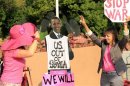 Code Pink demonstrators protest against potential U.S. military action in Syria at the U.S. Capitol in Washington