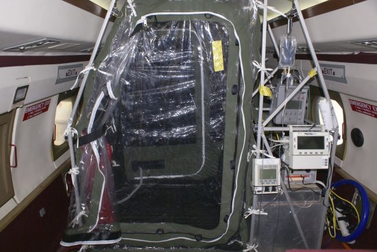The tentlike device installed on Phoenix Airs planes when biological containment is required. (CDC/Reuters)