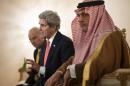 Minister of Foreign Affairs Prince Saud al-Faisal bin Abdulaziz al-Saud (R) listens as US Secretary of State John Kerry makes a statement to the press on January 5, 2014 in Riyadh