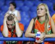 Dissapointed Netherlands' team supporters react after their Group B Euro 2012 soccer match against Denmark in Kharkiv
