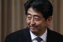 Japan's Prime Minister Shinzo Abe attends a seminar on Japan-UK security cooperation in Tokyo