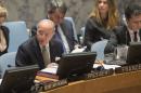 This photo provided by the United Nations shows French Foreign Minister Laurent Fabius as he addresses United Nations Security Council, Friday, March 27, 2015. Fabius said the council should refer the situation in Iraq and Syria to the International Criminal Court. (AP Photo/United Nations, Eskinder Debebe)