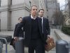Michael Steinberg (C) leaves Manhattan Federal Court in New York