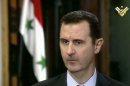This image made from video shows Syrian President Bashar Assad during an interview broadcast on Al-Manar Television on Thursday, May 30, 2013. (AP Photo/Al-Manar Television via AP video)