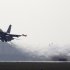 A 31st Fighter Wing United States Air Force F-16 jet fighter takes off at the Aviano NATO airbase ,in Aviano, Italy, Friday, March 25, 2011. (AP Photo/Luca Bruno)
