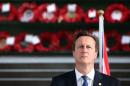 Britain's PM Cameron looks on as he attends a "Last Post" ceremony at the Menin Gate in Ypres