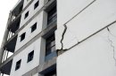 A wall at the University of Costa Rica's school of electrical engineering is damaged after an earthquake in San Jose, Costa Rica, Wednesday, Sept. 5, 2012. A powerful, magnitude-7.6 earthquake shook Costa Rica and a wide swath of Central America on Wednesday. (AP Photo/Thomas Dooley)