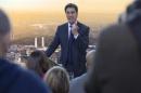 Britain's leader of the opposition Labour party Ed Miliband delivers a speech at Battersea Power Station in London