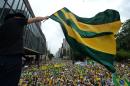 Demonstrators rally to protest against the government of president Dilma Rousseff in Sao Paulo on March 15, 2015