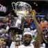 Team USA forward LeBron James holds the Global Community Cup after defeating Brazil 80-69 in an Olympic exhibition men's basketball game, Monday, July 16, 2012, in Washington. (AP Photo/Alex Brandon)