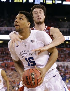 Wisconsin had Jahlil Okafor wrapped up most of the night, but he scored a couple of big baskets late. (AP)