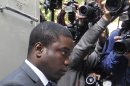 FILE- City trader Kweku Adoboli, arrives at Court in London in this file photo dated Thursday Sept. 22, 2011, where he is accused of fraud and false accounting at Swiss banking giant UBS. Adoboli broke down in tears as he took the stand for the first time Friday Oct. 26, 2012, as he insisted he had acted purely to help save the bank he considered his family. Adoboli has pleaded not guilty to all charges against him. (AP Photo/Sang Tan, File)
