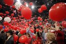 In this Sept. 4, 2008, photo, balloons fall on the floor as Republican presidential nominee John McCain is joined by his wife, Cindy, his family and his running mate, Sarah Palin, and her family, not pictured, on stage after his acceptance speech at the Republican National Convention in St. Paul, Minn. Viewer interest in the 2012 Republican and Democratic national conventions is still unclear. With the parties' quadrennial presidential nominating gatherings fast approaching, organizers on both sides are bedeviled by a similar challenge: how to ensure TV viewer interest in the multiday affairs, which threaten to be largely predictable spectacles nearly devoid of suspense. (AP Photo/Jae C. Hong)