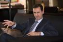 Syria's President Bashar al-Assad speaks during an interview with French magazine Paris Match,in Damascus
