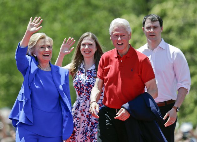 Democratic presidential candidate former Secretary of State Hillary Rodham Clinton waves to supporters as her husband former President Bill Clinton, s...
