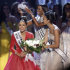 Miss USA, Olivia Culpo, left, is crowned Miss Universe during the Miss Universe competition, Wednesday, Dec. 19, 2012, in Las Vegas. (AP Photo/Julie Jacobson)
