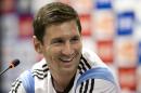 Argentina's Lionel Messi listens to a question at a news conference after a training session in Vespasiano, near Belo Horizonte, Brazil, Monday, June 16, 2014. Argentina plays in group F of the 2014 soccer World Cup. (AP Photo/Victor R. Caivano)