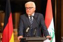 Germany's Foreign Minister Frank-Walter Steinmeier speaks to the press as Iraq's acting Foreign Minister Hussein Shahristani (unseen) listens on during a joint press conference in Baghdad on August 16, 2014