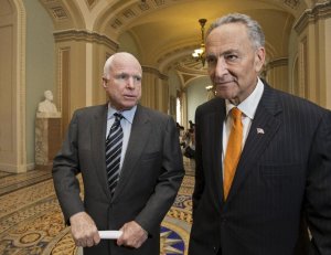 Sen. John McCain, R-Ariz., left, and Sen. Charles Schumer, …