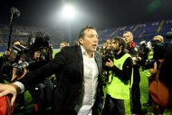Belgium's football coach Marc Wilmots celebrates his team's victory over Croatia during their World Cup 2014 qualifying match in Zagreb on October 11, 2013