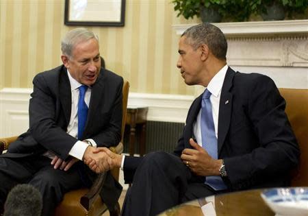 U.S. President Barack Obama shakes hands with Israeli Prime Minister Benjamin Netanyahu in the Oval Office of the White House in Washington