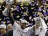 Baltimore Ravens linebacker Ray Lewis (52) holds a newspaper and the Vince Lombardi Trophy as he celebrates after defeating the San Francisco 49ers 34-31 in the NFL Super Bowl XLVII football game, Sunday, Feb. 3, 2013, in New Orleans. (AP Photo/Evan Vucci)