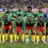 Cameroon's national soccer team pose for a photo during a 2010 World Cup Group E soccer match against Denmark in Pretoria