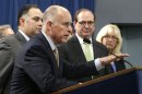 Gov. Jerry Brown, center, discusses a proposal to reduce California's prison population, at a Capitol news conference in Sacramento, Calif., Tuesday, Aug. 27, 2013. In response to a federal court order to reduce the state's prison population, Brown announced a $315 million plan to send thousands of inmates to private prisons and to empty county jail cells to avoid what he and his supporters say would be a mass release of dangerous felons. Brown was joined by legislative leaders, Assembly Speaker John Perez, D-Los Angeles, left, Senate Minority Leader Bob Huff, of Diamond Bar, second right, and Assembly Minority Leader Connie Conway, of Tulare, right. (AP Photo/Rich Pedroncelli)