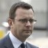 File photograph shows former News of the World editor Andy Coulson arriving to hear charges of phone hacking at Westminster Magistrates Court in London