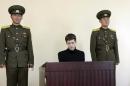 U.S. citizen Matthew Todd Miller sits in a witness box during his trial at the North Korean Supreme Court