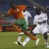 Saif Eldin Ali Idris Farah of Sudan challenges Rainford Kalaba of Zambia during their African Nations Cup quarter-final soccer match in Bata