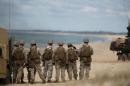 NATO soldiers attend a NATO military exercise at Raposa beach, near Setubal