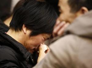 Angry Chinese families threaten hunger strike over missing plane.