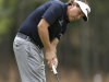 Phil Mickelson watches his putt on the third hole during the second round of the Wells Fargo Championship golf tournament at Quail Hollow Club in Charlotte, N.C., Friday, May 3, 2013. (AP Photo/Chuck Burton)