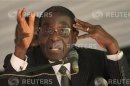 Zimbabwe President Mugabe addresses memorial service for retired general Mujuru at Ruzambo Farm in Beatrice