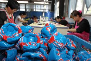 Workers make 2014 FIFA World Cup gift balls in a factory&nbsp;&hellip;