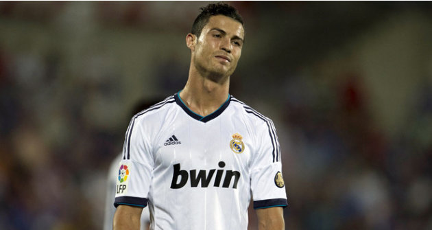 رحيل الدون من النادى الملكى Cristiano-Ronaldo-Getafe-v-Real-Madrid-2012-2818092-jpg_124437