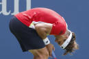 David Ferrer, of Spain, reacts after a shot against Marin Cilic, of Croatia, during the third round of the 2014 U.S. Open tennis tournament, Sunday, Aug. 31, 2014, in New York. (AP Photo/Seth Wenig)