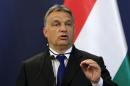 Orban attends a news conference in Budapest