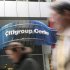 People walk past the Citigroup headquarters in New York