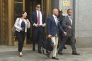 Jonathan Roper Fernando Serrano walk with Serrano's lawyer Jude Cardenas after they pleaded not guilty in Manhattan New York