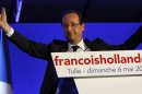 President-elect Francois Hollande waves to the crowd after his election in Tulle, central France, Sunday, May 6, 2012. Francois Hollande defeated Nicolas Sarkozy on Sunday to become France's next president, Sarkozy conceded defeat minutes after the polls closed. (AP Photo/Christophe Ena)