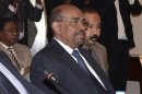 Sudan's President Omar Hassan al-Bashir attends a meeting with leaders from South Sudan at the National Palace in the Ethiopian capital Addis Ababa